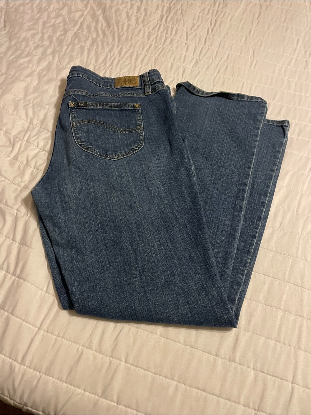 Lee bootcut women's jeans in a blue medium wash